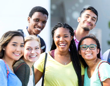 Diverse group of young adults smiling