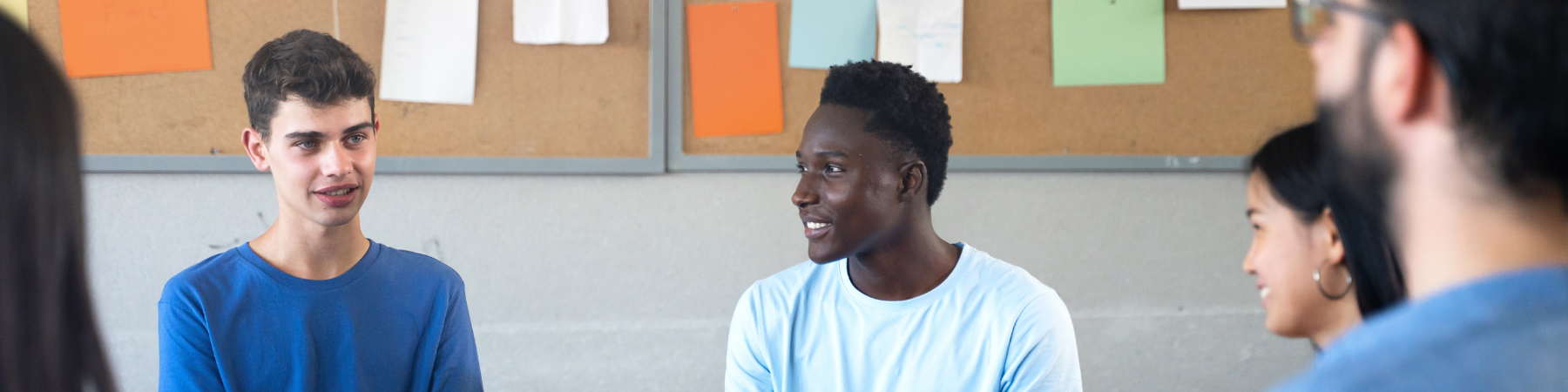 group of diverse young people talking
